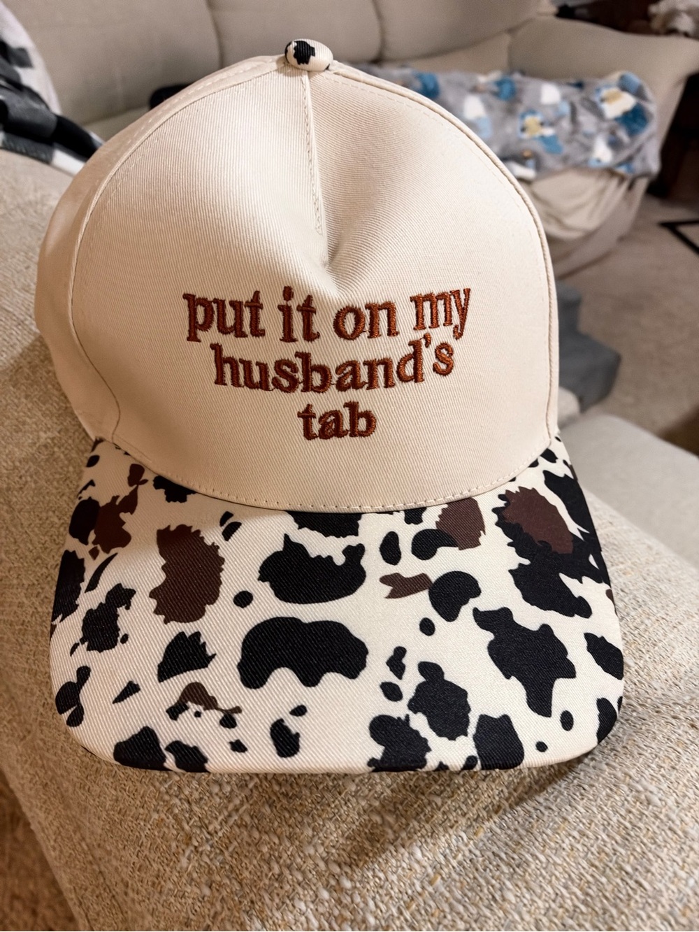NWOT Cream Cow-Print Cap with Embroidered Slogan put it in my husband’s tab